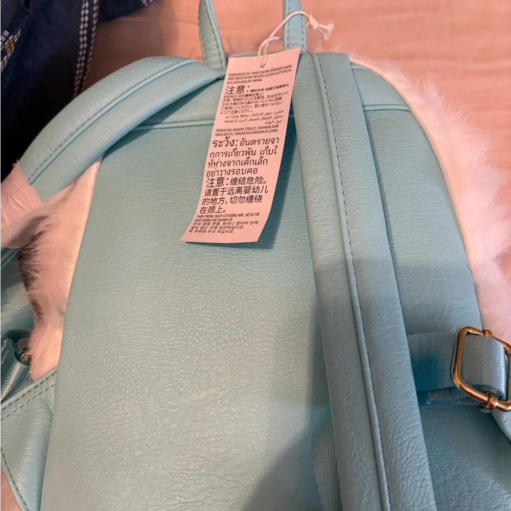 Loungefly White Furry Yeti Backpack with Pink and Blue Goggle Patch - Picture 2 of 4